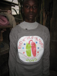 Mohamed wearing a shirt with the end world hunger 2045 logo